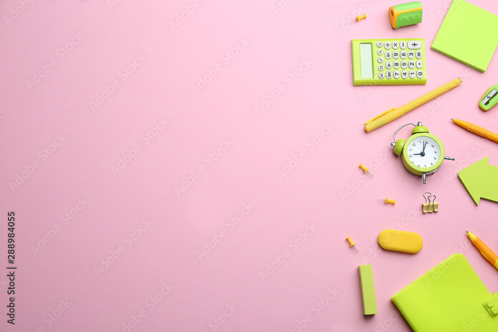 Bright school stationery on pink background, flat lay. Space for text Bright school stationery on pink background, flat lay. Space for text