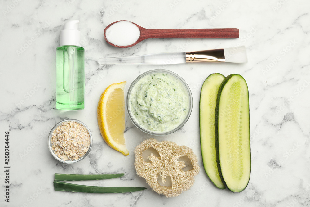 Flat lay composition with handmade face mask and ingredients on marble table Flat lay composition with handmade face mask and ingredients on marble table