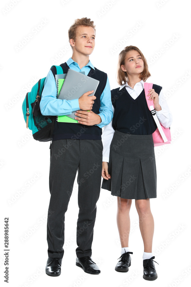 Happy pupils in school uniform on white background Happy pupils in school uniform on white background
