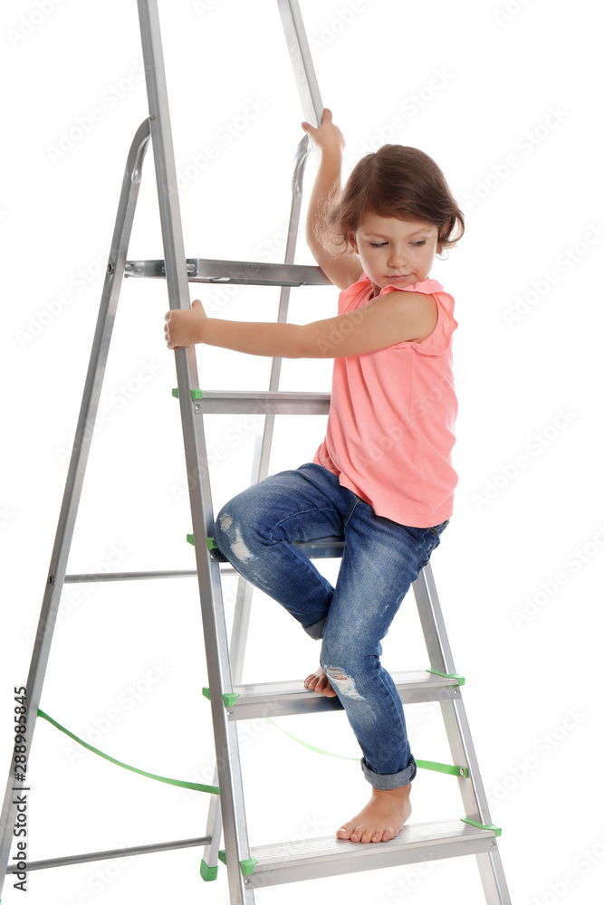 Little girl climbing up ladder on white background. Danger at home Little girl climbing up ladder on white background. Danger at home