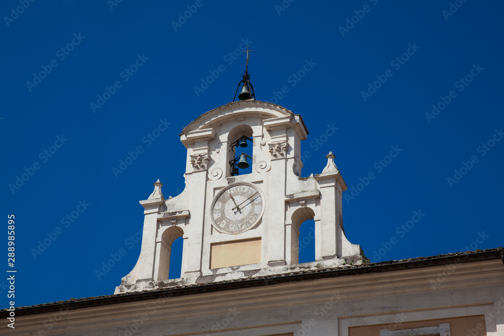 Clock and bell tower of the Salvatore Hospital in Piazza San Giovanni in Laterano founded in 1216