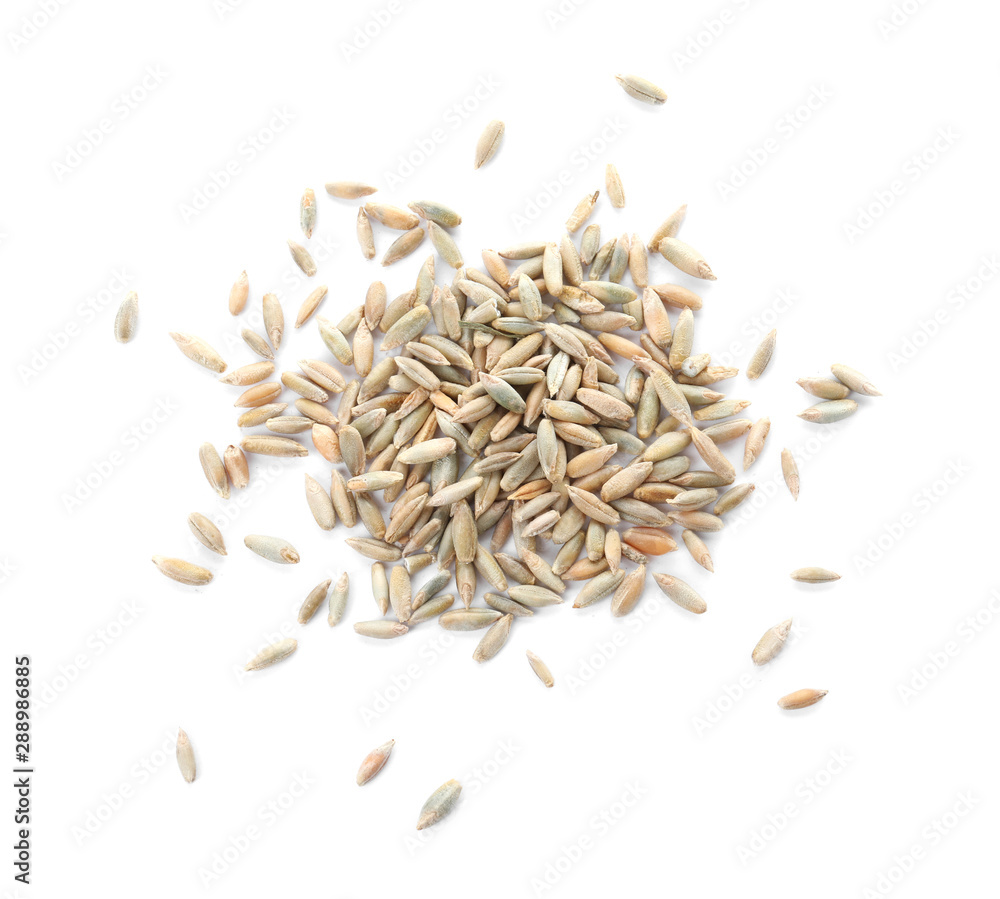 Pile of rye grains on white background, top view. Cereal crop