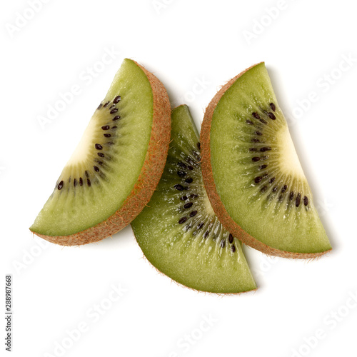 Three kiwi fruit slices isolated on white background closeup. Half of kiwi slice. Kiwifruit slice,  flatlay. Flat lay, top view.