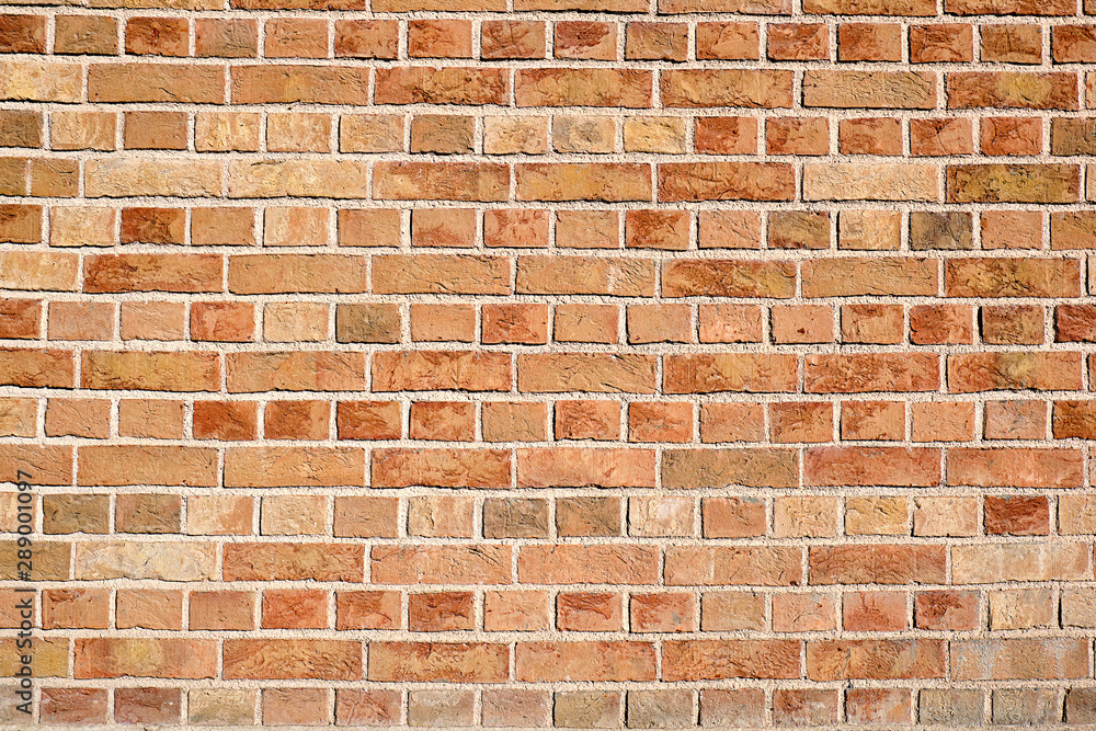 Obraz premium Background from a evenly red brick wall