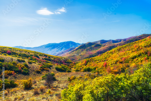 Fall mountains in valley. Happy and bright sunny day