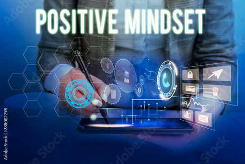 Text sign showing Positive Mindset. Business photo showcasing mental attitude in wich you expect favorable results Woman wear formal work suit presenting presentation using smart device