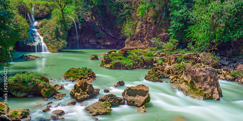 Long exposure panorama of the limestone ridge with cascades and waterfalls of Semuc Champey in the Peten jungle and rainforest of Guatemala. photo