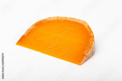 french cow's milk cheese mimolette isolated on white