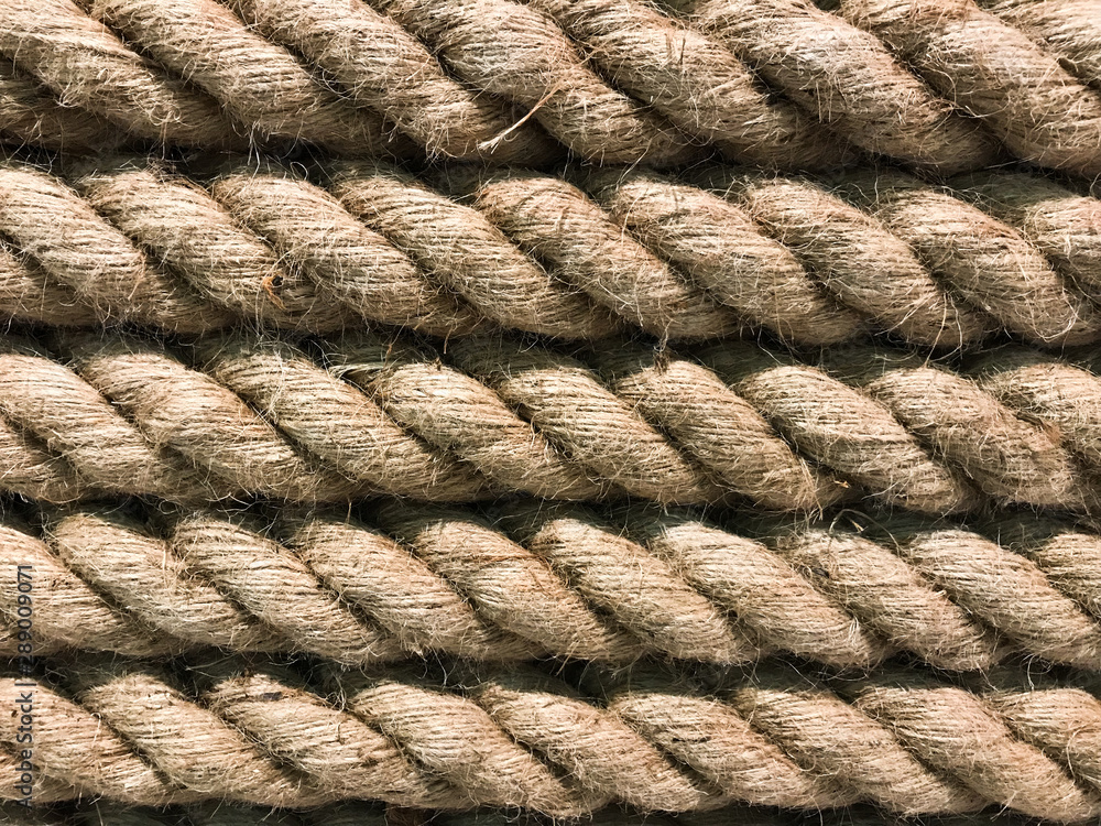 full frame shot of five natural brown ramie or hemp twist ropes in line, using for background full frame shot of five natural brown ramie or hemp twist ropes in line, using for background