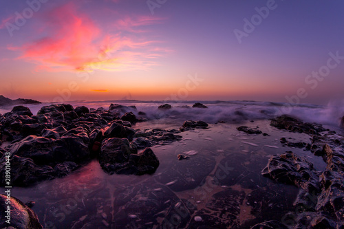 dramatic sunrise scene over the ocean in hawaii © Ryan