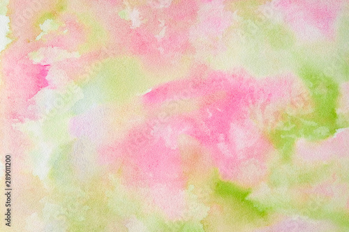 Abstract pink-green watercolor background, bright, contrast splashes, drops, smudges. Artistic background with paper texture.