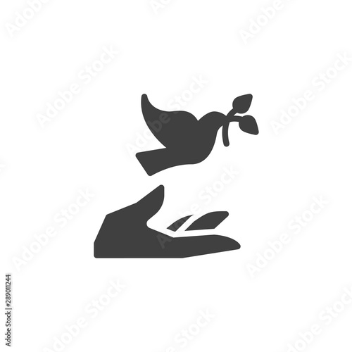 Hand and pigeon vector icon. filled flat sign for mobile concept and web design. Dove with olive branch and hand glyph icon. Freedom and peace symbol, logo illustration. Vector graphics