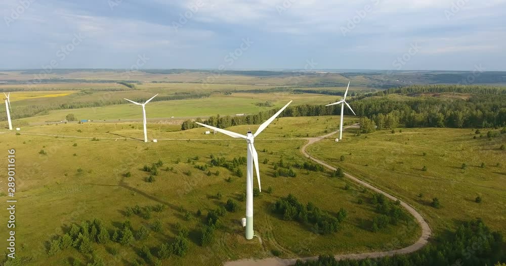 Russia. Ufa. Eco-friendly energy. Aerial shot of wind generator. Windmill or Wind power technology concept. Electric power production. Green energy. 4k Russia. Ufa. Eco-friendly energy. Aerial shot of wind generator. Windmill or Wind power technology concept. Electric power production. Green energy. 4k