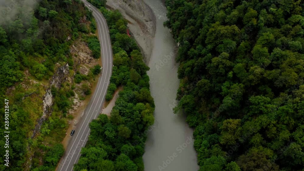 Flying in a mountain gorge. Aerial survey Flying in a mountain gorge. Aerial survey