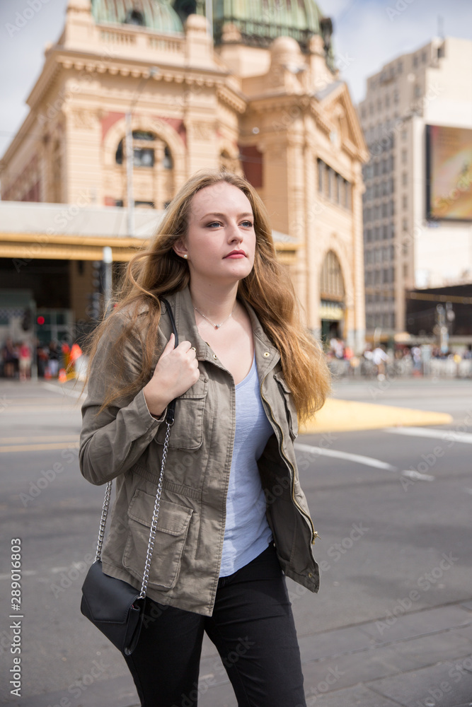 Tourist Exploring Downtown Melbourne on Foot Tourist Exploring Downtown Melbourne on Foot