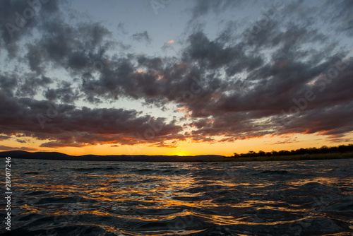 dramatic sunset over a calm sea