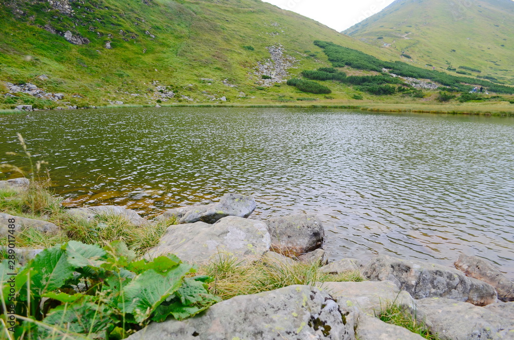 A lake called Nesamovite, located in the Ukrainian Carpathians at an altitude of 1750 m. A lake called Nesamovite, located in the Ukrainian Carpathians at an altitude of 1750 m.