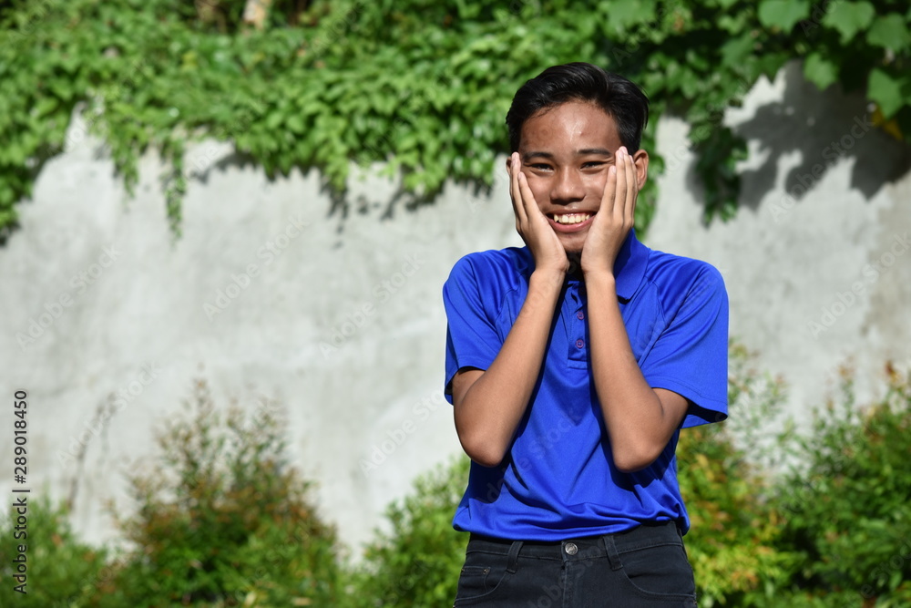A Surprised Young Filipino Teenager Boy