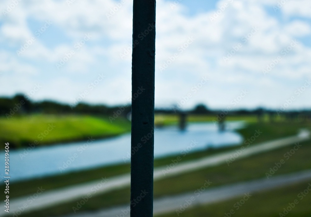 Fototapeta premium Landscape River And Bridge Blue Sky Background