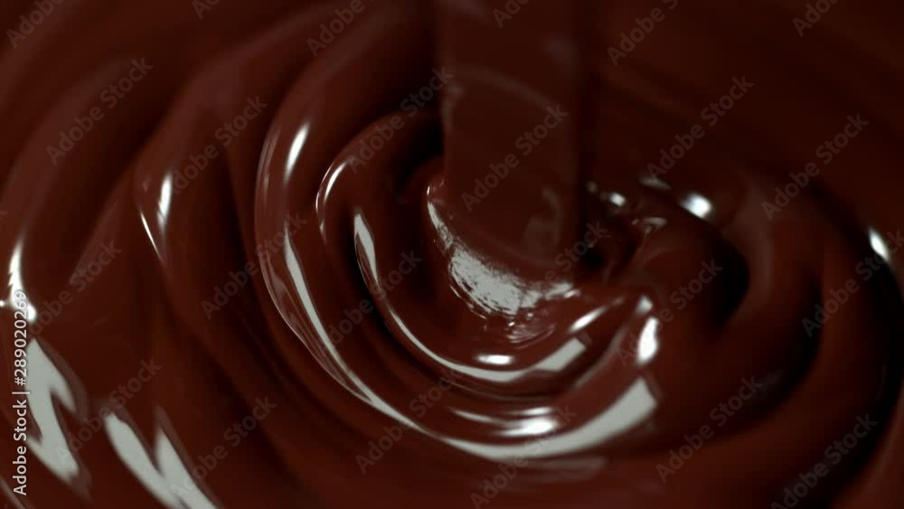 Super Slow Motion Shot of Pouring Meldet Chocolate at 1000fps. Shooted with High Speed Cinema Camera. Super Slow Motion Shot of Pouring Meldet Chocolate at 1000fps. Shooted with High Speed Cinema Camera.
