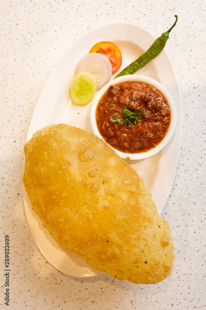 Indian Cuisine Chole Bhature Also Know as Chick Pea Curry, Chole Bhture