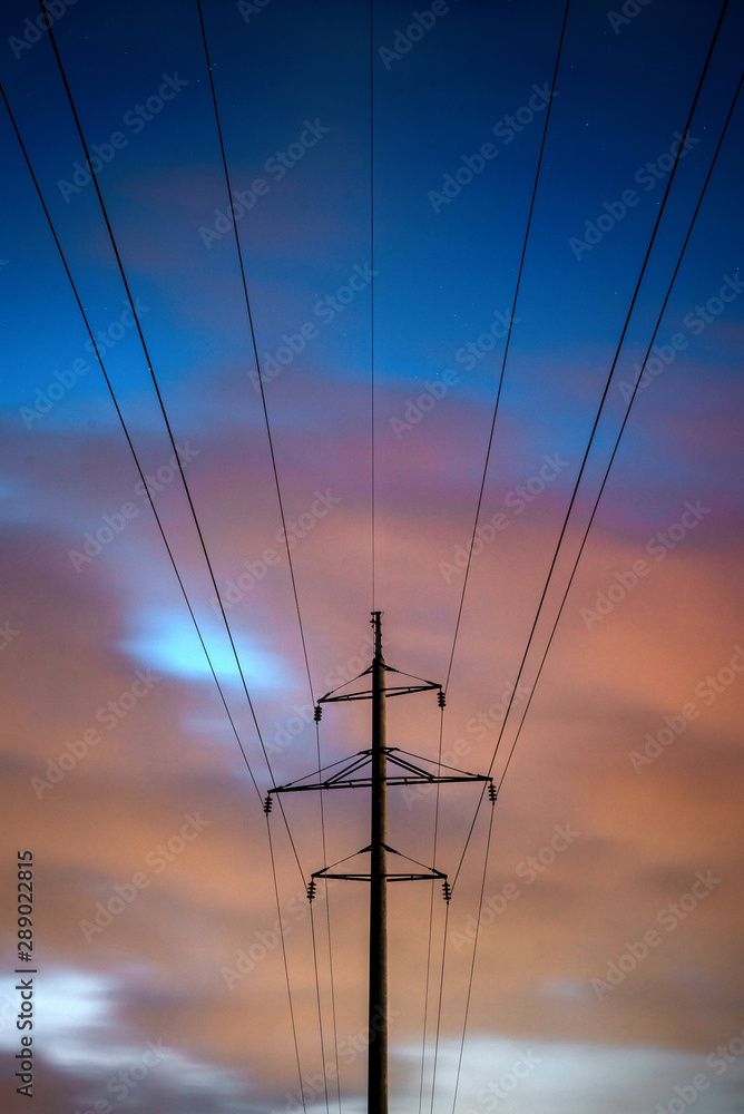 Power line at sunset. Electricity