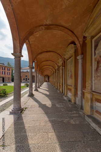 The beautiful arcade of the Via Crucis in the monumental complex of Baveno, Verbano, Italy