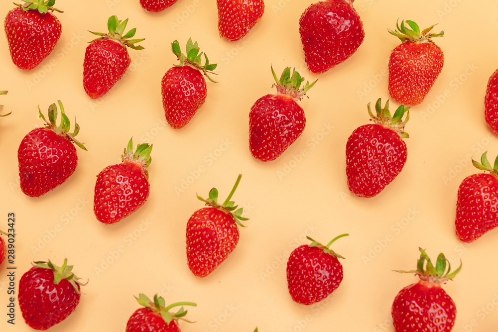 Strawberry flat lay on yellow background pattern Strawberry flat lay on yellow background pattern