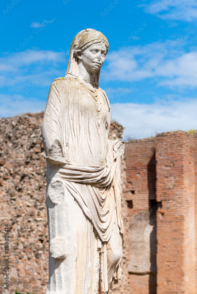 Antique marble statue of Vestal Vigin. House of Vestals at Roman Forum, Rome, Italy Antique marble statue of Vestal Vigin. House of Vestals at Roman Forum, Rome, Italy