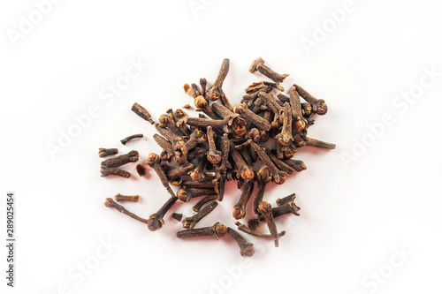Seasonings are isolated on a white background. cloves on a white background close-up and copy space.