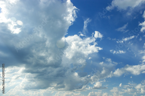 Blue sky and beautiful fluffy cloud. Best summer sky photo background.