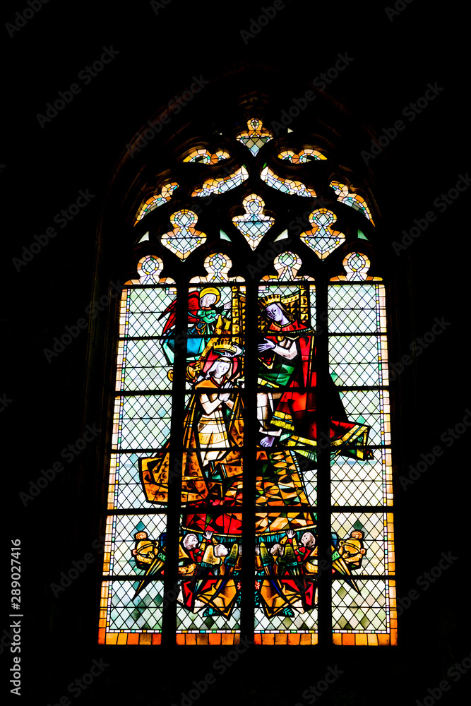 A detailed view of stained glass windows in the church of Saint Germain in Rennes in France