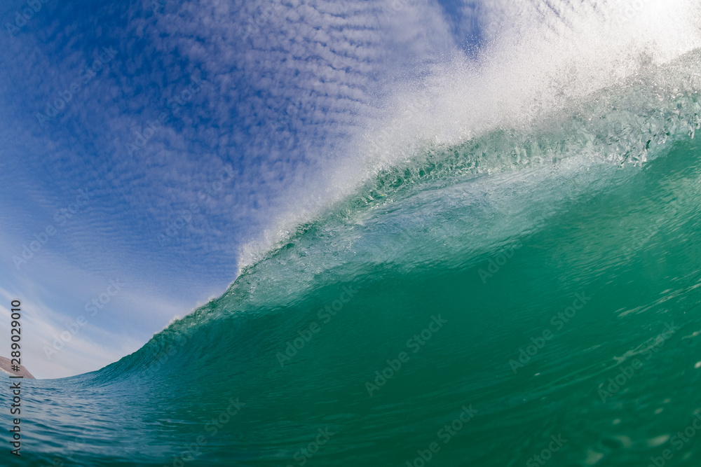 huge surfing wave breaking close to camera man huge surfing wave breaking close to camera man