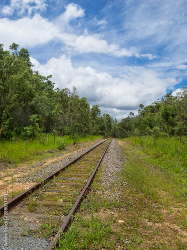 Rusty railway tracks near Kuranda in Tropical North Queensland, Australia