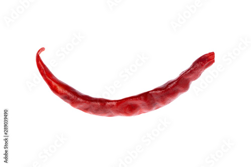 Macro image of dried red chilli pepper isolated at white background. Natural spicy food