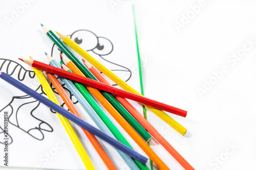 Children's coloring with colored pencils, copy space