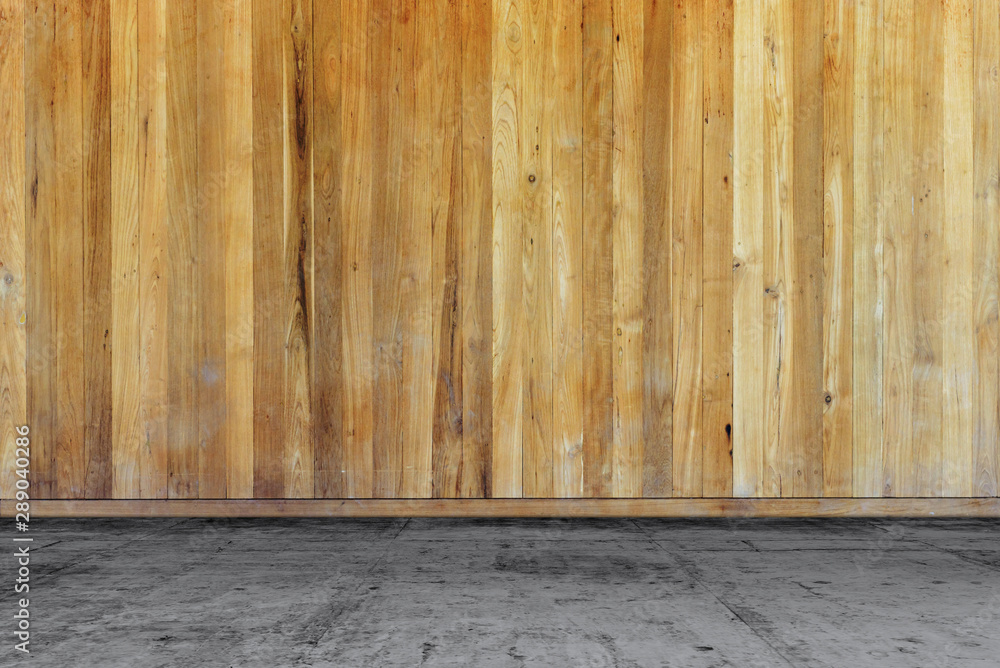 Empty room - concrete floor with wooden wall Empty room - concrete floor with wooden wall