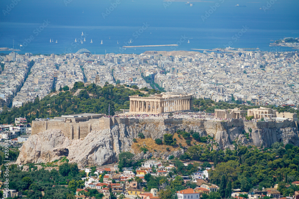 The Acropolis in centre of  urban Athens view from top Mount Lycabettus