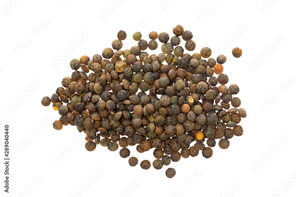 Macro flatlay image of brown lentils pile isolated at white background. Macro flatlay image of brown lentils pile isolated at white background.