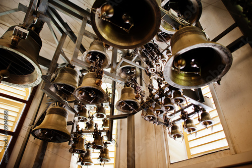 Billede på lærred Close-up view of metal orthodox church bells in tower.