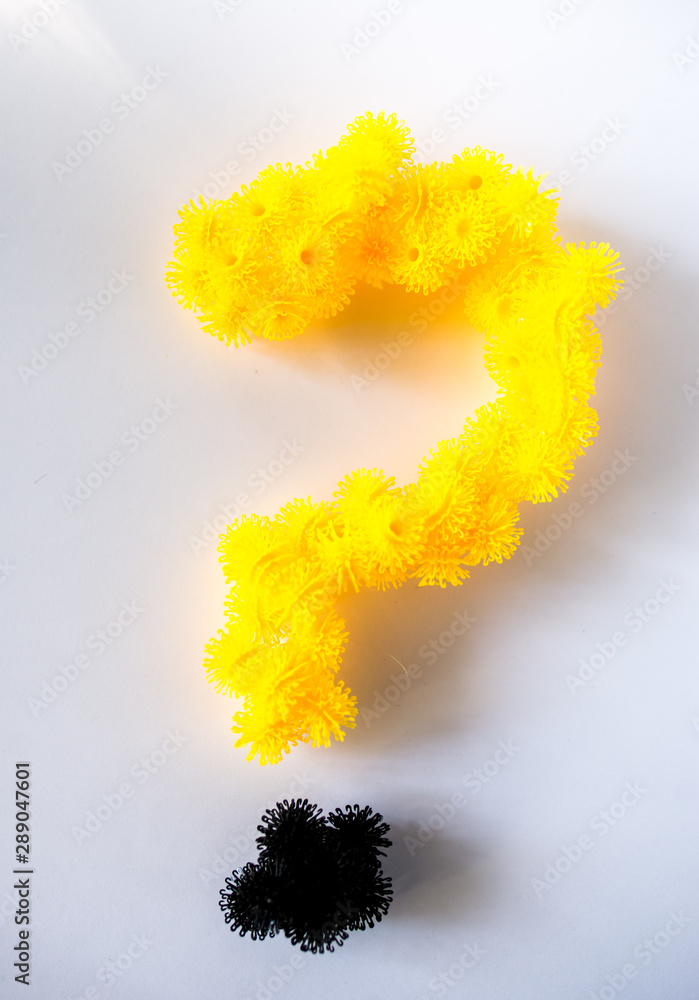 question mark made of colored plastic parts question mark made of colored plastic parts