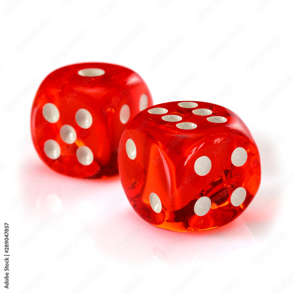 Red acrylic transparent dice for games. Two gambling translucent dices isolated on white background, macro close-up high resolution. Red acrylic transparent dice for games. Two gambling translucent dices isolated on white background, macro close-up high resolution.