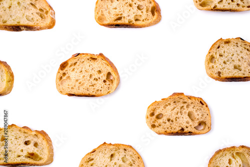Pattern with pieces of white bread isolated on white background.