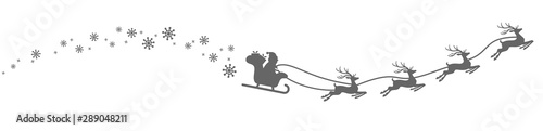 Santa Claus with sled and reindeers
