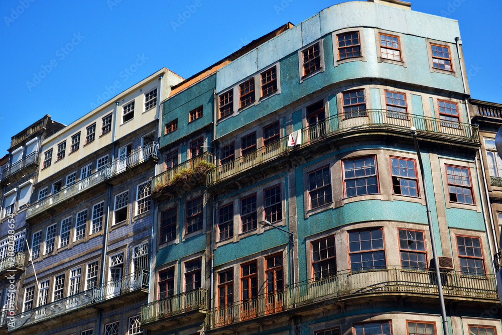 Porto, Portugal - August 20th 2015 : focus on antiquated blue building.
