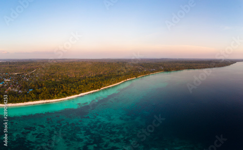 Aerial view tropical beach island reef caribbean sea at sunset. Kei Island, Indonesia Moluccas archipelago. Top travel destination, best diving snorkeling, stunning panorama. © fabio lamanna