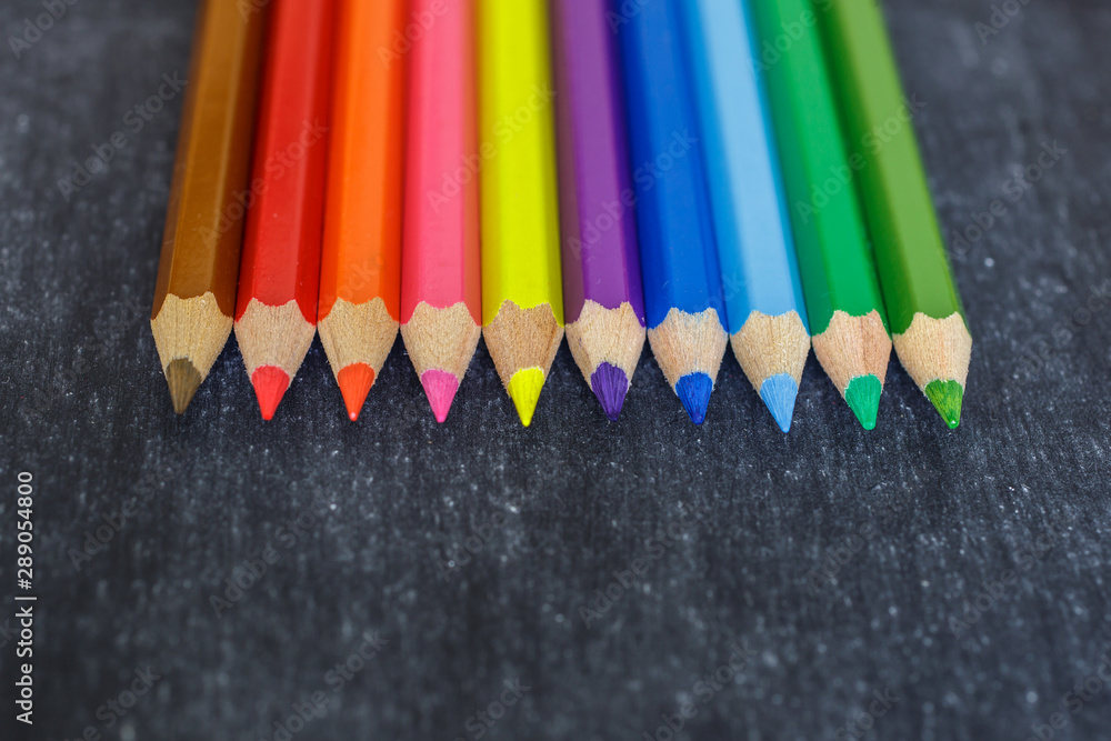 color pencils black board background color pencils black board background