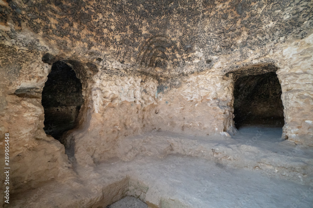 Obraz premium Inside the caves of Takht-e Rostam ancient buddhist stupa-monastery in Samangan, Afghanistan in August 2019