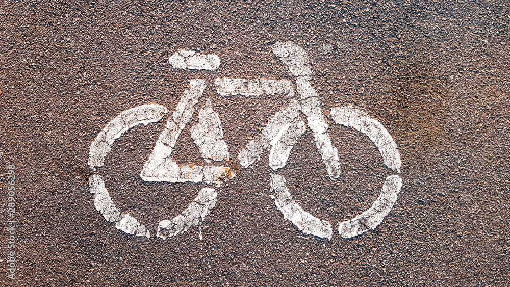 Bicycle sign or icon on the road in the park Bicycle sign or icon on the road in the park