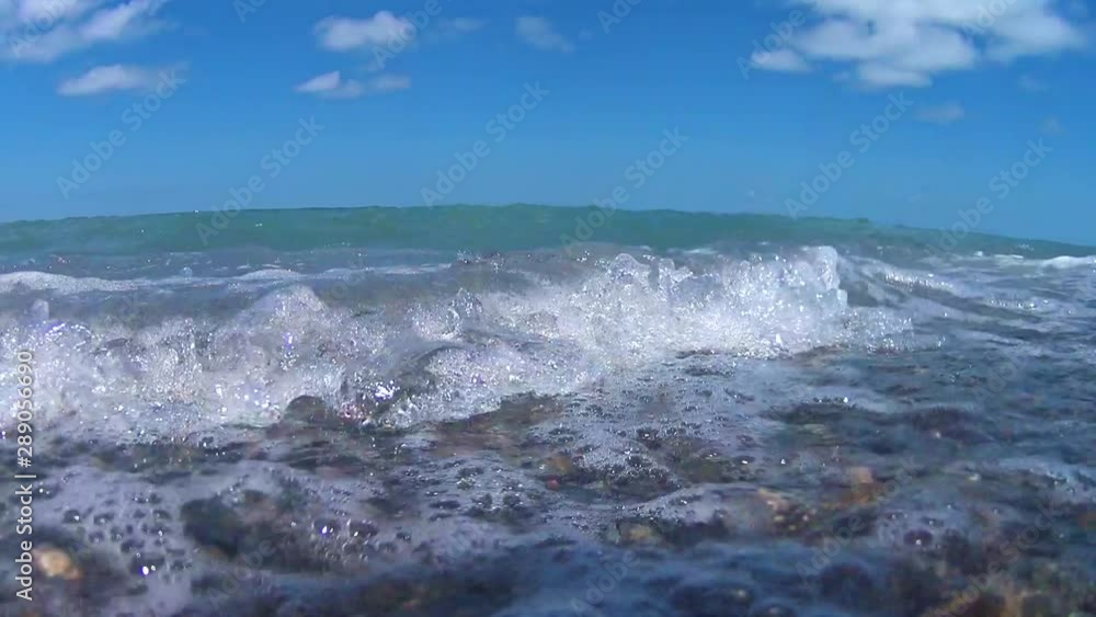 Waves in the sea, a wave covers the camera, under water. Waves in the sea, a wave covers the camera, under water.
